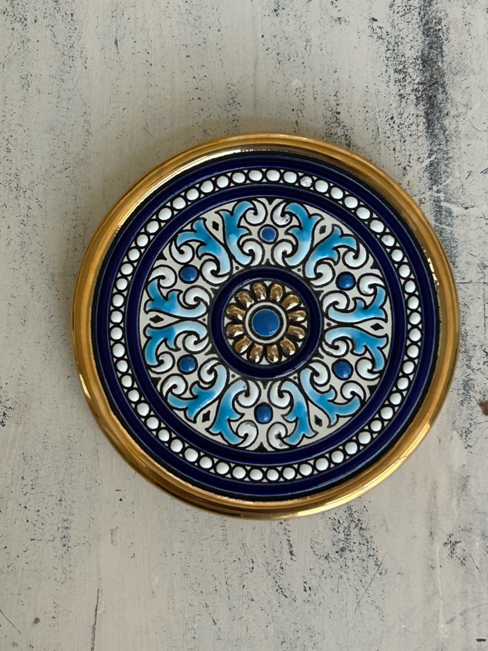 Cearco Spain, gold trimmed wall hanging/trivet